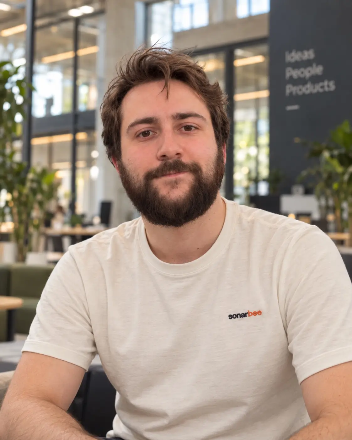 Hugo Kindel at Station F, in a Sonarbee T-shirt.